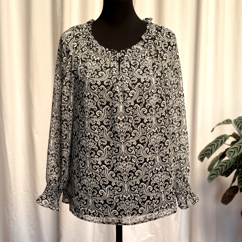 Talbots long sleeve top. Black and white sheer fabric over black. Size small.